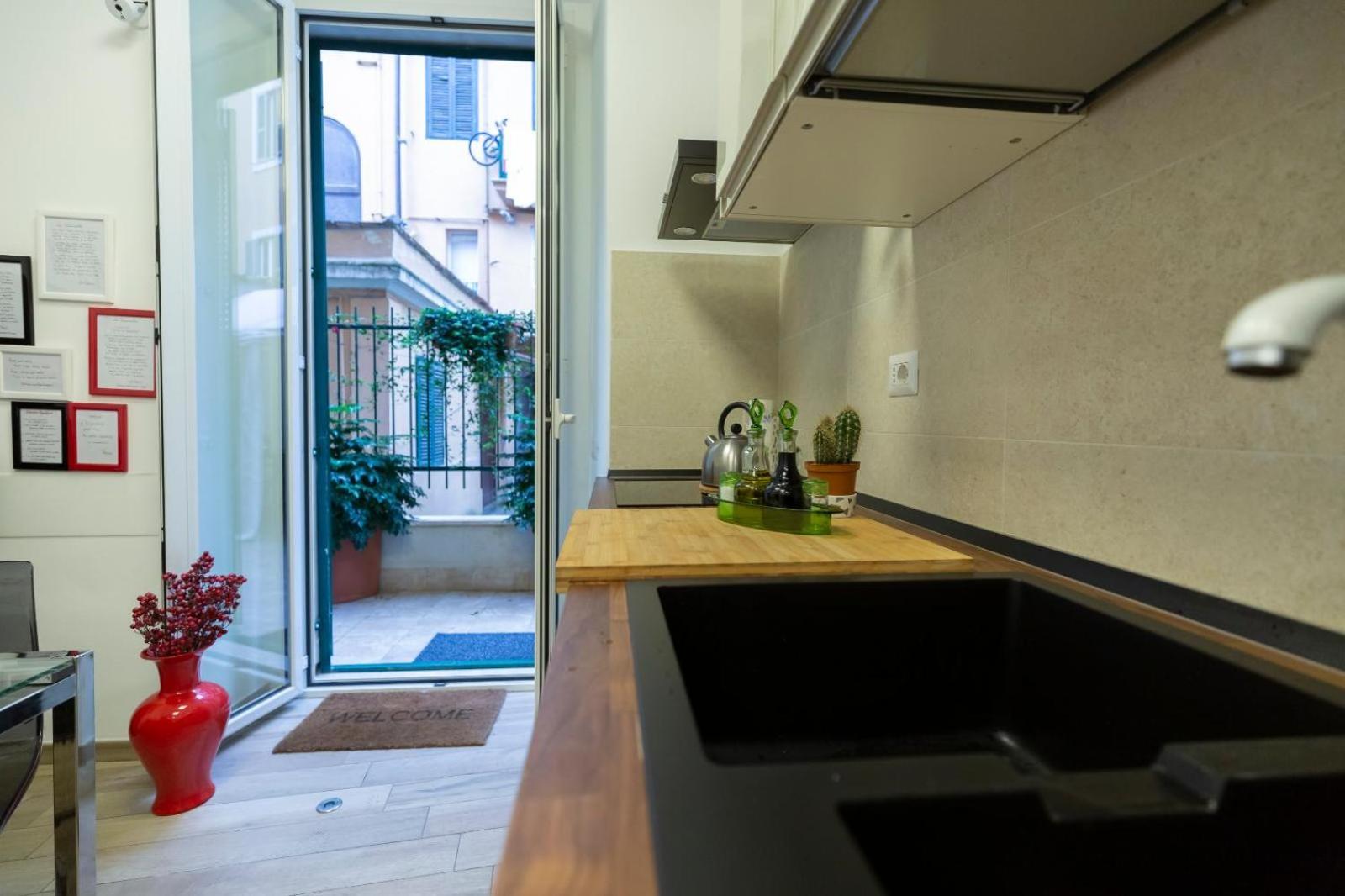Flatinrome Trastevere Deluxe Rooms - Green Patio Kültér fotó